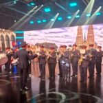 ¡Orgullo! Una banda de bomberos voluntarios recaudó  millones interpretando el Himno Nacional